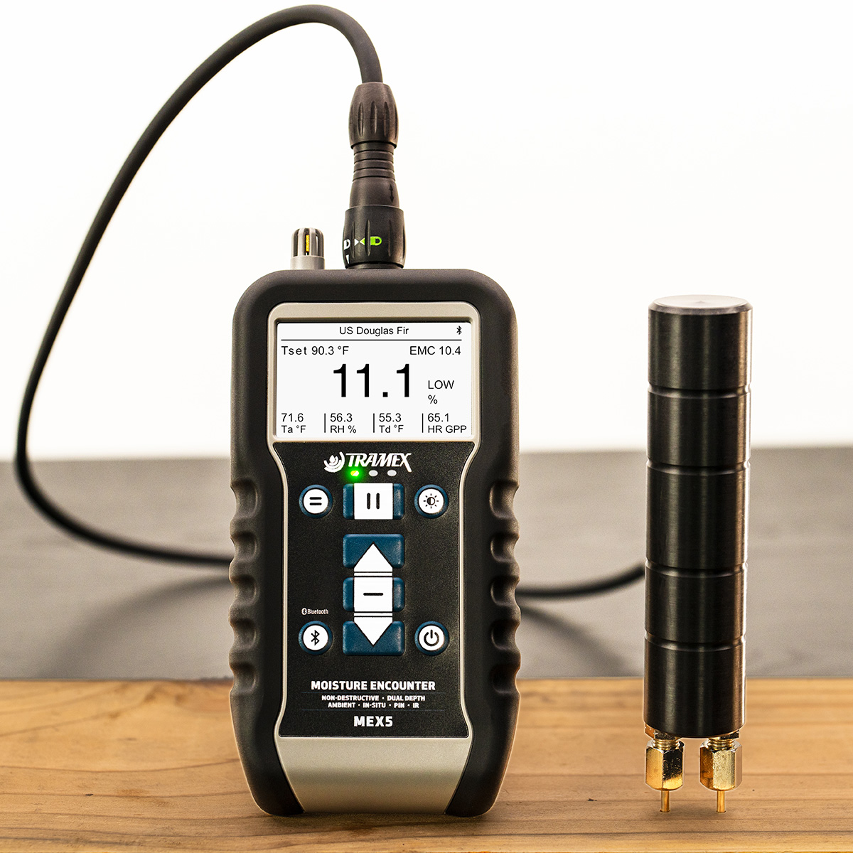 Tramex Moisture Encounter MEX5 with pin probe in wooden floorboard